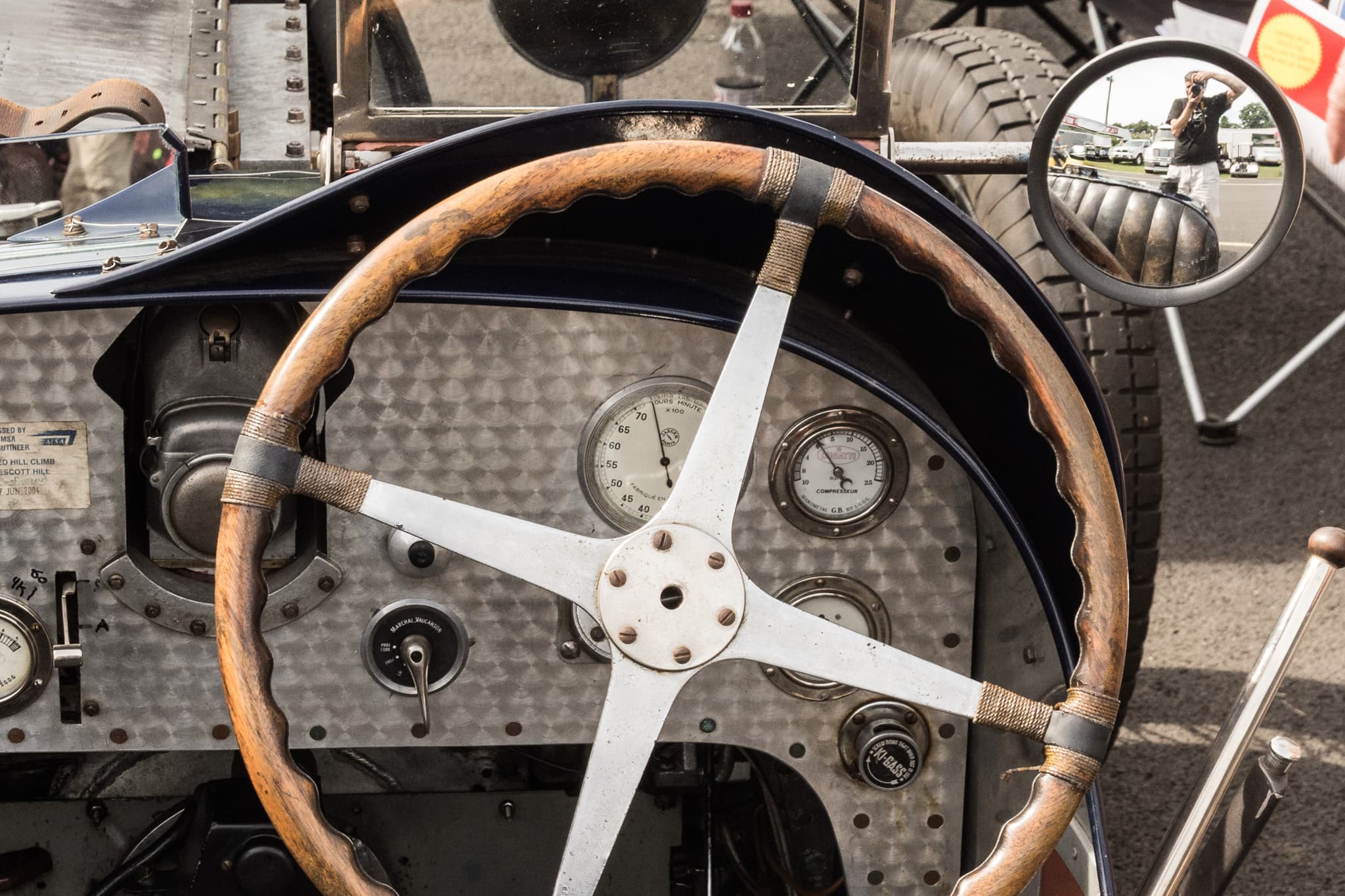 ViardPhotography self-portrait reflected in a vintage car cockpit mirror — automotive photographer New England