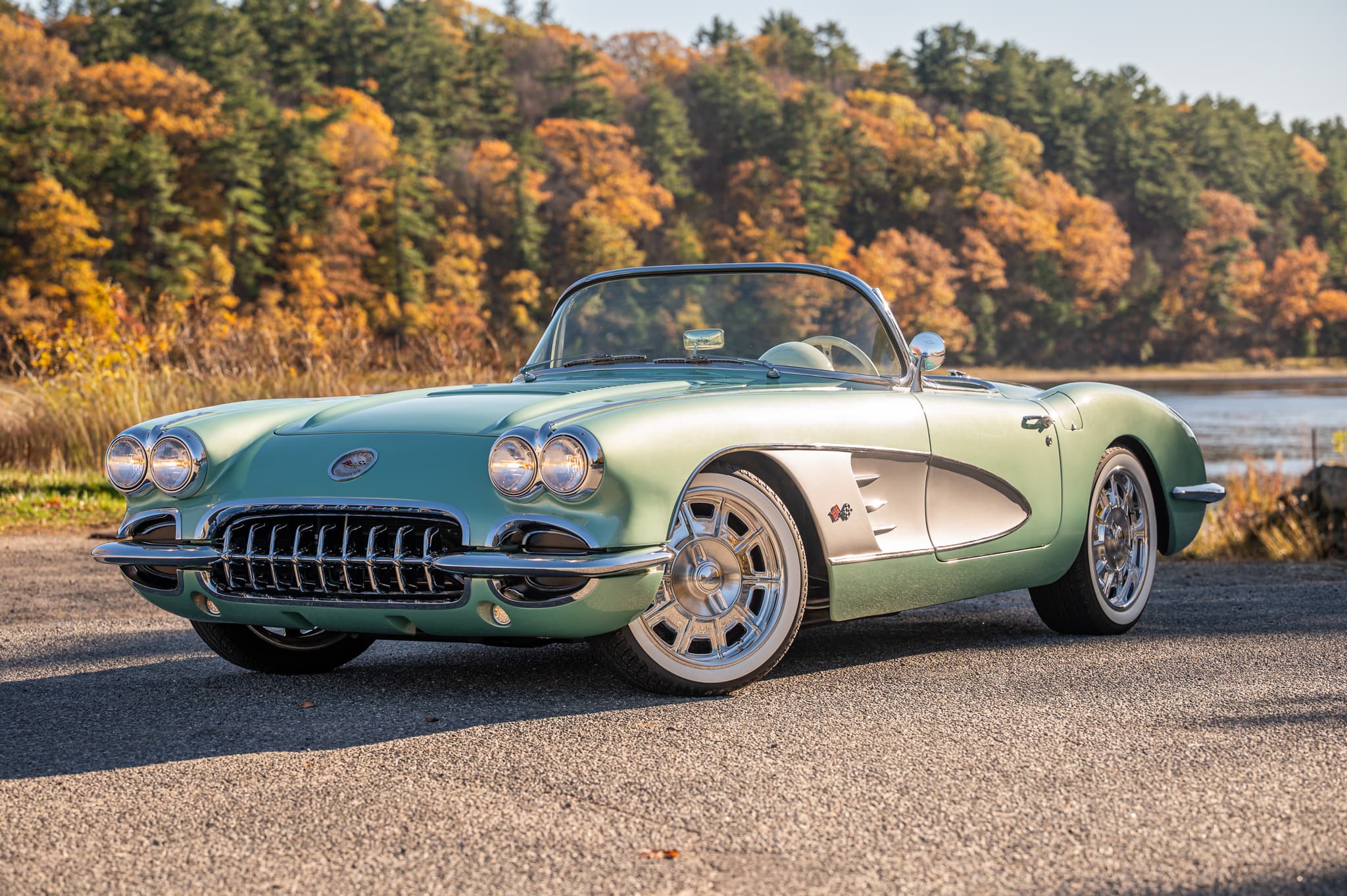 C1 Corvette in fall foliage at lakeside — New England automotive photography